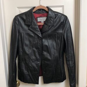 Wilson’s black leather jacket